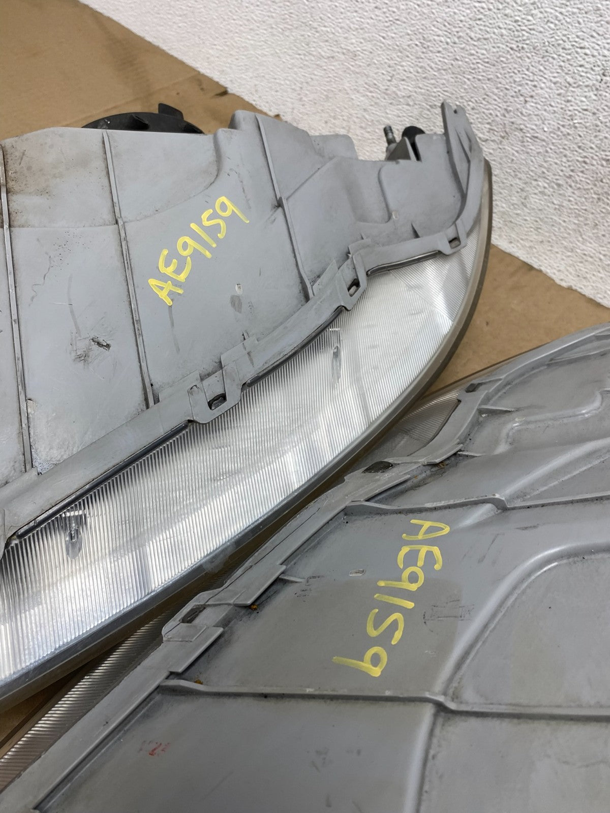 2004 - 2006 Chevrolet Aveo Hatchback Left+Right Headlights Halogen AE9159 DW10