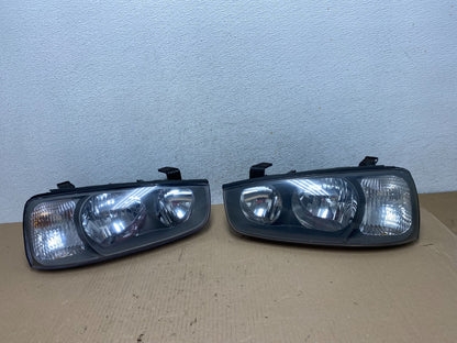 2001 2002 2003 Hyundai Elantra Left+Right Side Set Halogen Headlights AE7256 DW0