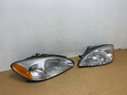 2000 to 2007 Ford Taurus Left+Right Side Halogen Headlights AD4624 DW2