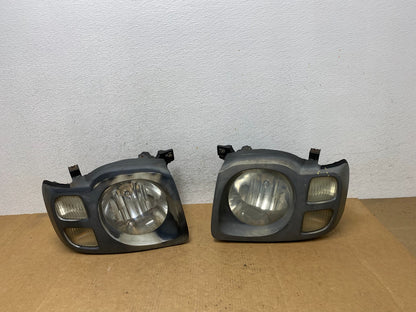 2002 2003 2004 Nissan Xterra Left+Right Side Headlights AE3089 DW0