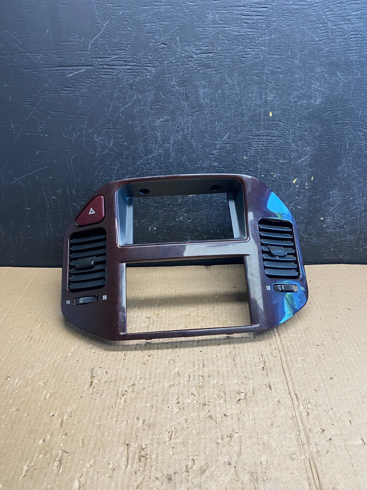 2000 to 2006 Mitsubishi Montero Dash Radio Climate Control Bezel AE4166 DG0