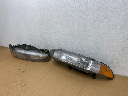 1997 to 1998 Mitsubishi Galant Left+Right Set Headlights Halogen AD2675 DW1