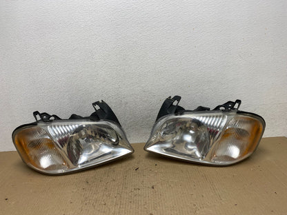 2001 2002 2003 2004 Mazda Tribute Left+Right Side Set Headlights AE9806 DW0