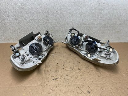 2003 to 2004 Toyota Corolla Left+Right Side Set Headlights W2743 DW7