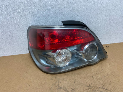 2006 to 2007 Subaru Impreza WRX Sedan OEM Left Driver LH Tail Light AC2902 DG0