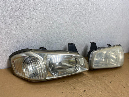 2000 to 2001 Nissan Maxima Left+Right Side Set Halogen Headlights AC7705 DW2