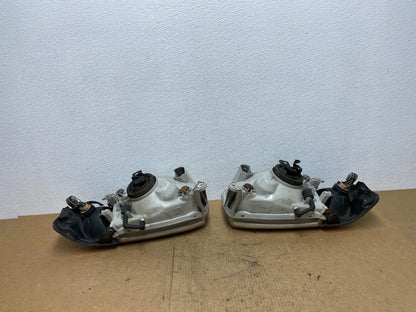 1999-2004 Nissan Pathfinder Left+Right Side Set Halogen Headlights Oem AC3436 DW5