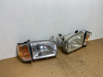 1999-2004 Nissan Pathfinder Left+Right Side Set Halogen Headlights AC3441 DW2