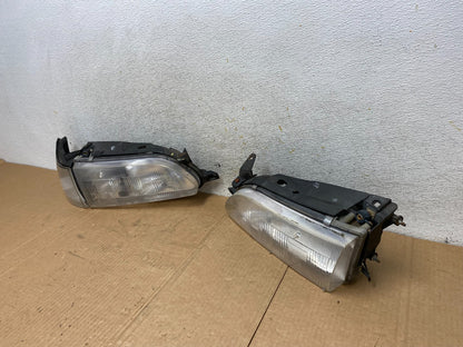 1993 to 1997 Toyota Corolla Left+Right Side Headlights AI4437 DW1