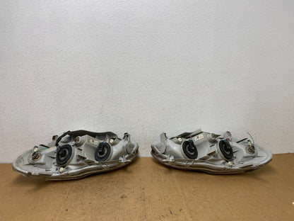 2003 to 2004 Toyota Corolla Left+Right Side Set Headlights AD0645 DW6
