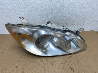 2003 to 2004 Toyota Corolla Right Passenger RH side Headlight AE9040 DW0