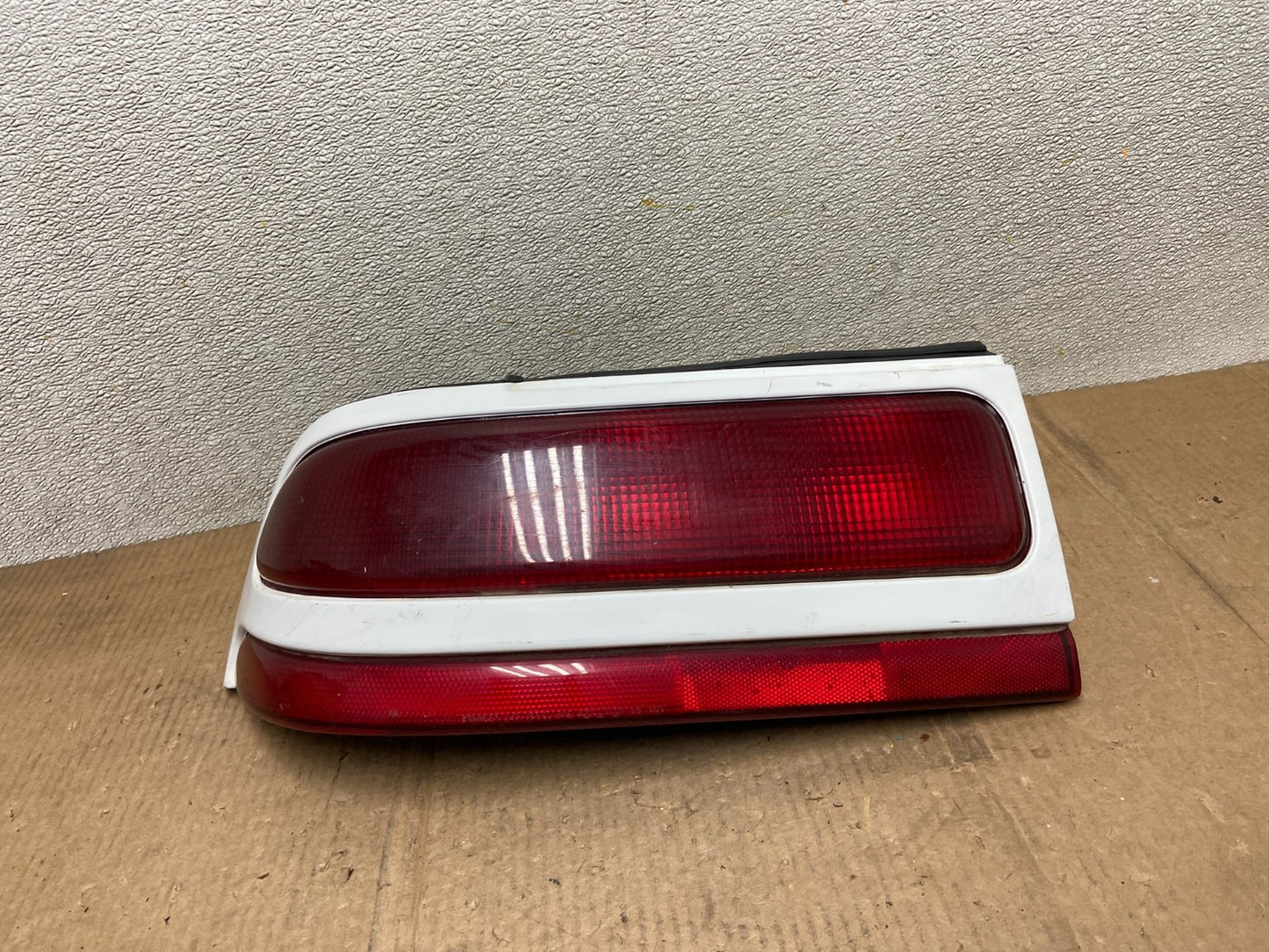 1992 to 1994 Plymouth Laser Left Driver Side tail Light AA64030