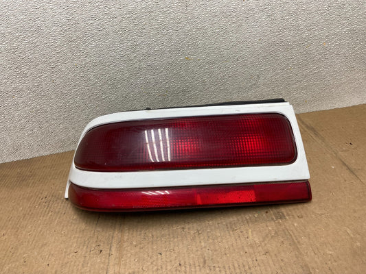 1992 to 1994 Plymouth Laser Left Driver Side tail Light AA64030