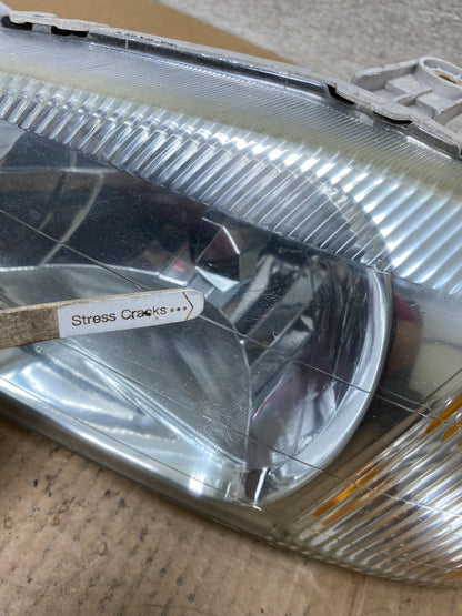 2000-2002 Hyundai Accent Left Driver LH Halogen Headlight AI6630 DW4