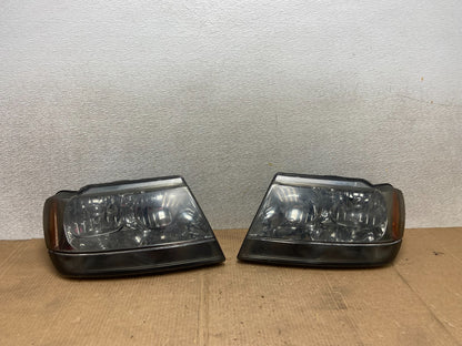1999 - 2004 Jeep Grand Cherokee Left+Right Set Halogen Headlights AA6502 DW0