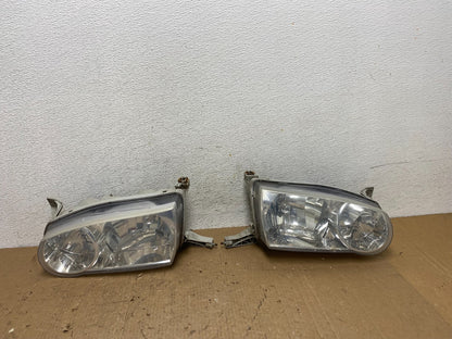 2001-2002 Toyota Corolla Left+Right Side Halogen Headlights AD8175 DW0