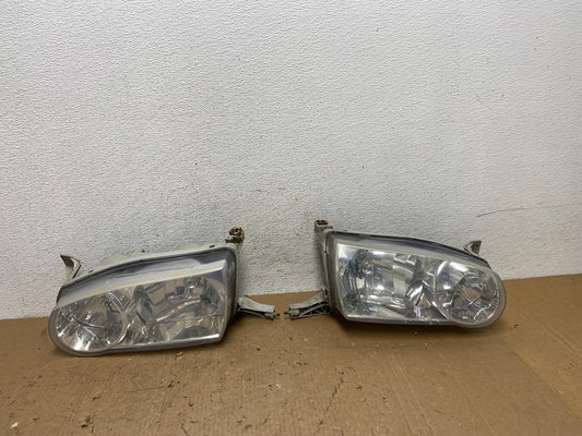 2001-2002 Toyota Corolla Left+Right Side Halogen Headlights AD8175 DW0