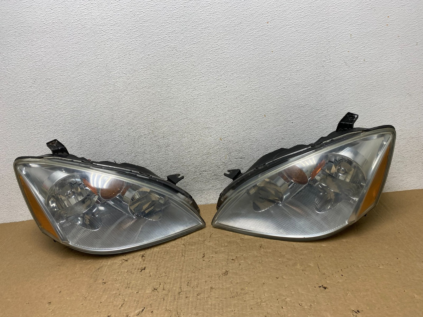 2002 to 2004 Nissan Altima Left+Right Side Set Halogen Headlights AF8139 DW0