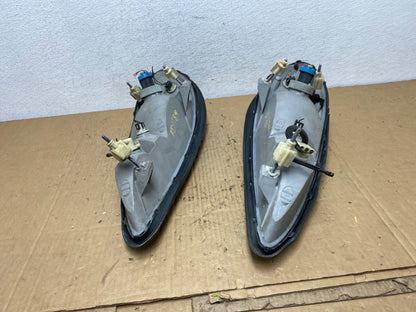 1999 to 2005 Pontiac Grand Am Left+Right Set Headlights AD1184 DG9