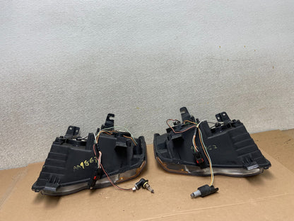2009-2010 Jeep Grand Cherokee Left+Right Set Halogen Headlights AA9867 DW7