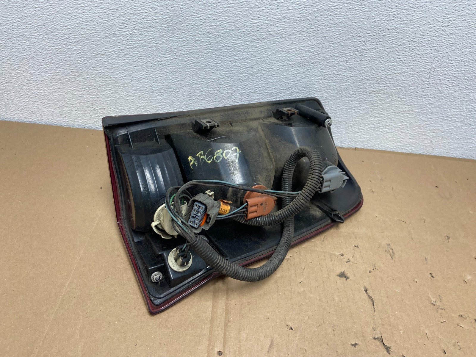 2002 to 2006 Cadillac Escalade Left Driver Side Tail Light OEM AB6807 DW5