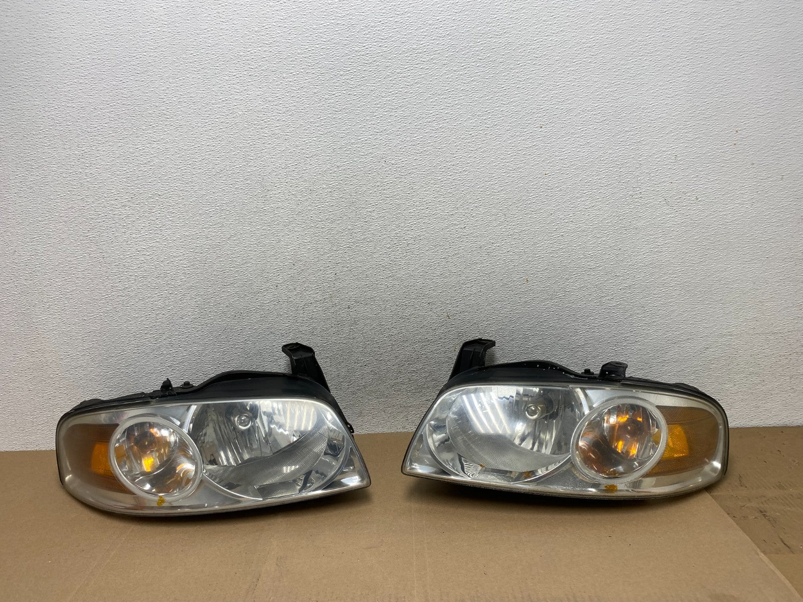 2004 - 2006 Nissan Sentra Halogen Left+Right Headlights AE6630 DW0