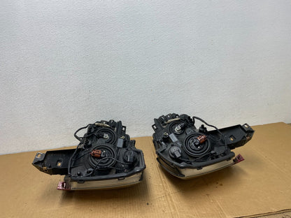 2004 to 2007 Nissan Armada Left+Right Side Set Headlights AC7718 DW9