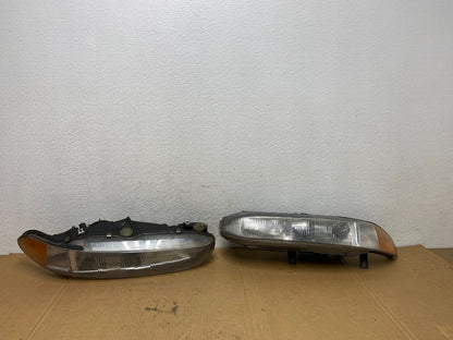 1997 to 1998 Mitsubishi Galant Left+Right Set Headlights Halogen AD2675 DW0