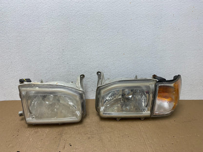 1999-2004 Nissan Pathfinder Left+Right Side Set Halogen Headlights AC5824 DW0