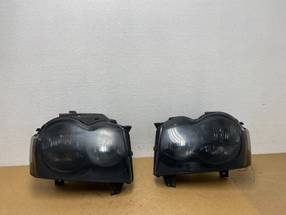 2005-2007 Jeep Grand Cherokee Left+Right Halogen Headlights AC1796 DW0