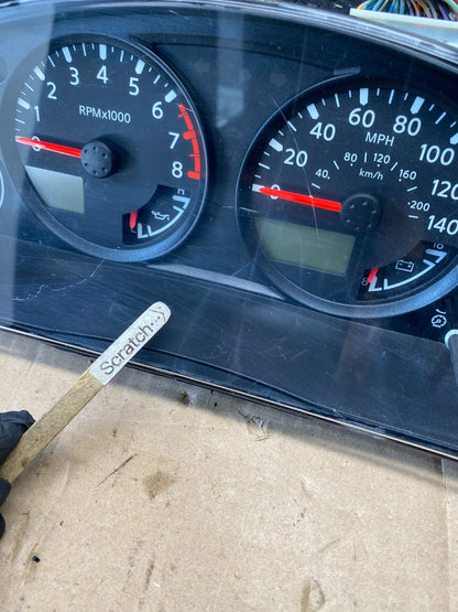 2005 Nissan Xterra Frontier Speedometer Cluster Gauge OEM R8876 DG3