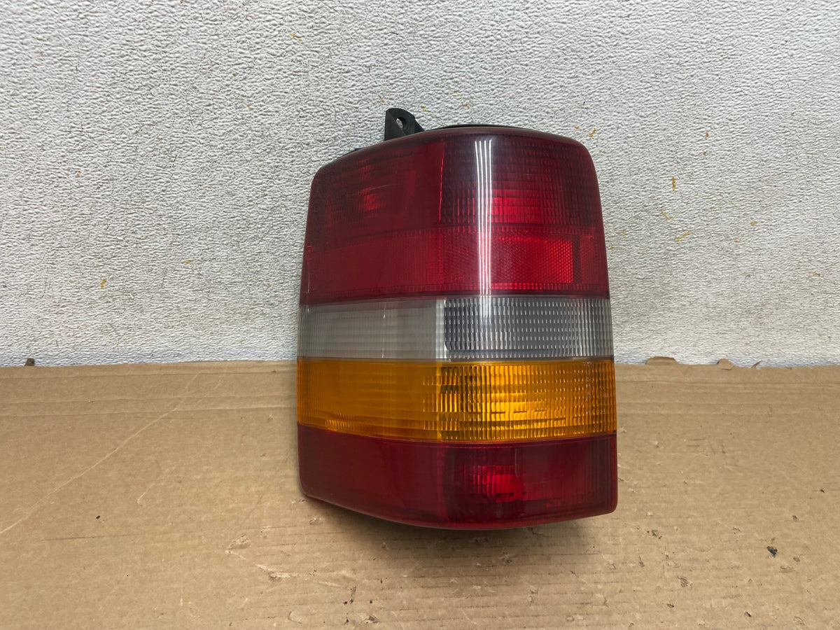 1993-1998 Jeep Grand Cherokee ZJ Left Driver Side Tail Light AH8544 LK0