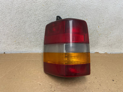 1993-1998 Jeep Grand Cherokee ZJ Left Driver Side Tail Light AH8544 LK0