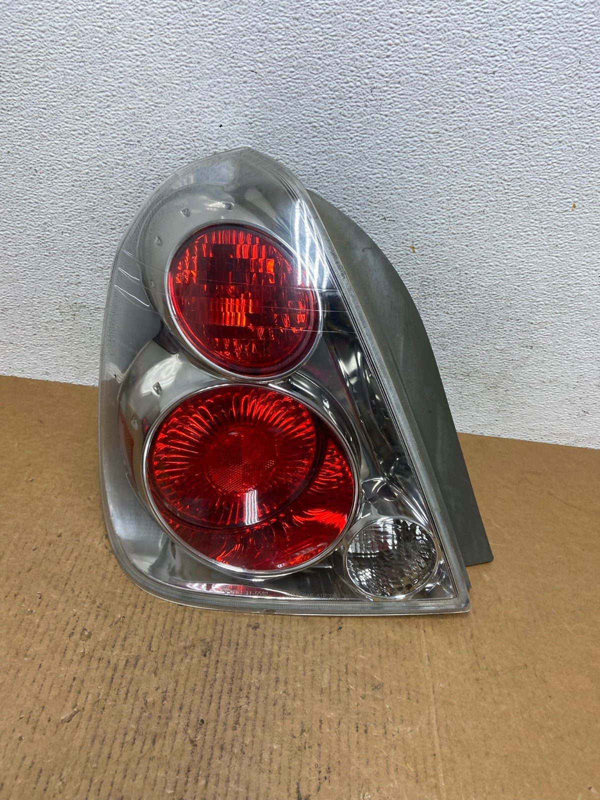 2005 to 2006 Nissan Altima Left Driver Side Tail Light DEPO AD9325 LK0