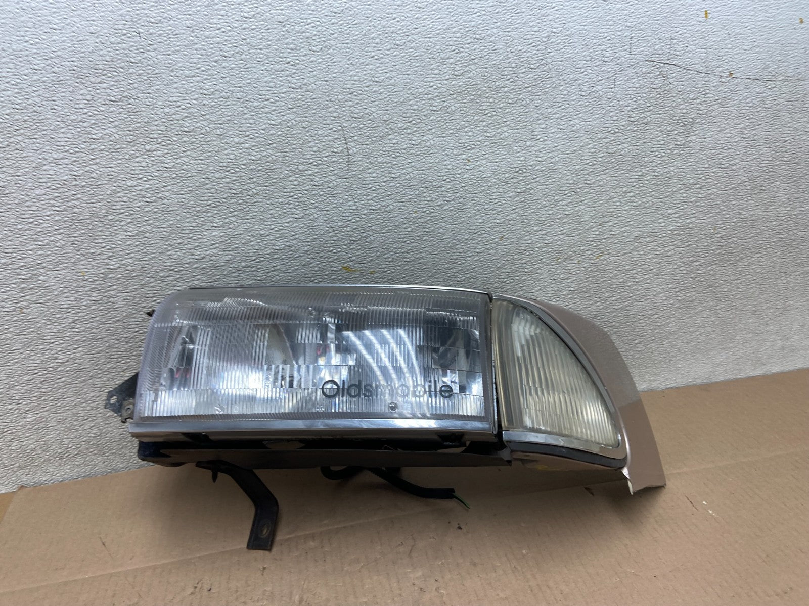 1991 to 1993 Oldsmobile Ninety Eight Left Driver Side Headlight Z39760