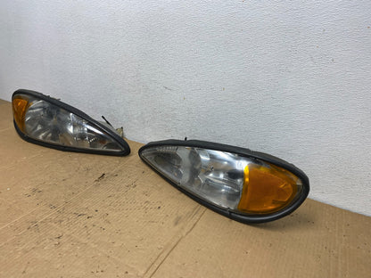 1999 to 2005 Pontiac Grand Am Left+Right Set Headlights AD1184 DG1