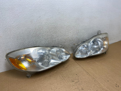 2003 to 2004 Toyota Corolla Left+Right Side Set Headlights AI6514 DW2