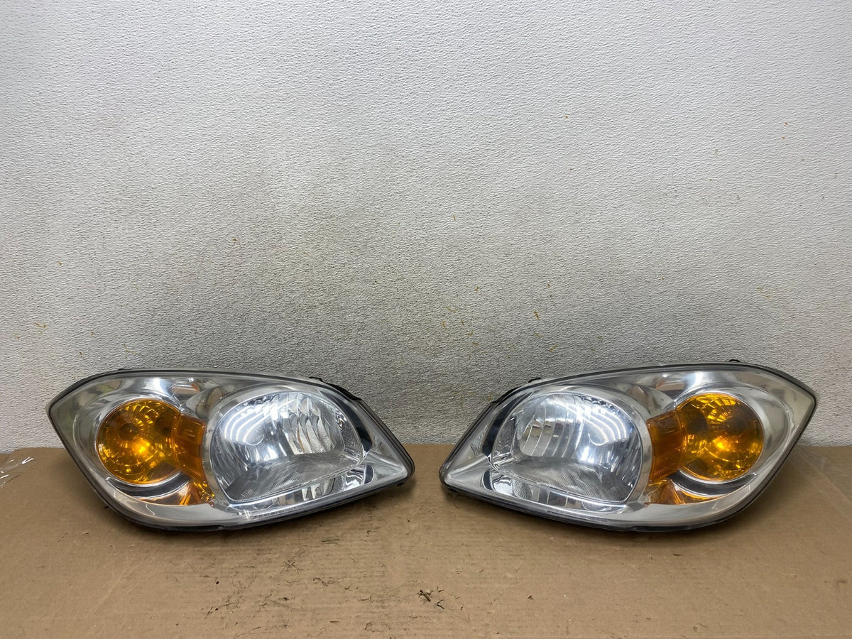 2005 - 2010 Chevrolet Cobalt Sedan Left+Right Headlights AI0959 DW0