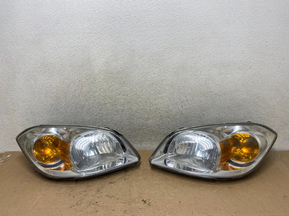 2005 - 2010 Chevrolet Cobalt Sedan Left+Right Headlights AI0959 DW0
