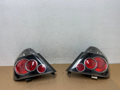 2007 to 2010 Scion TC Left+Right Set Black Tail Lights AD7924 LK0