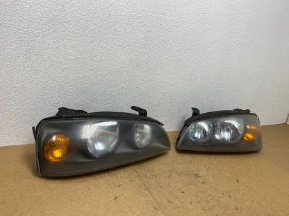 2004 to 2006 Hyundai Elantra Left+Right Set Halogen Headlights AC3577 DW2