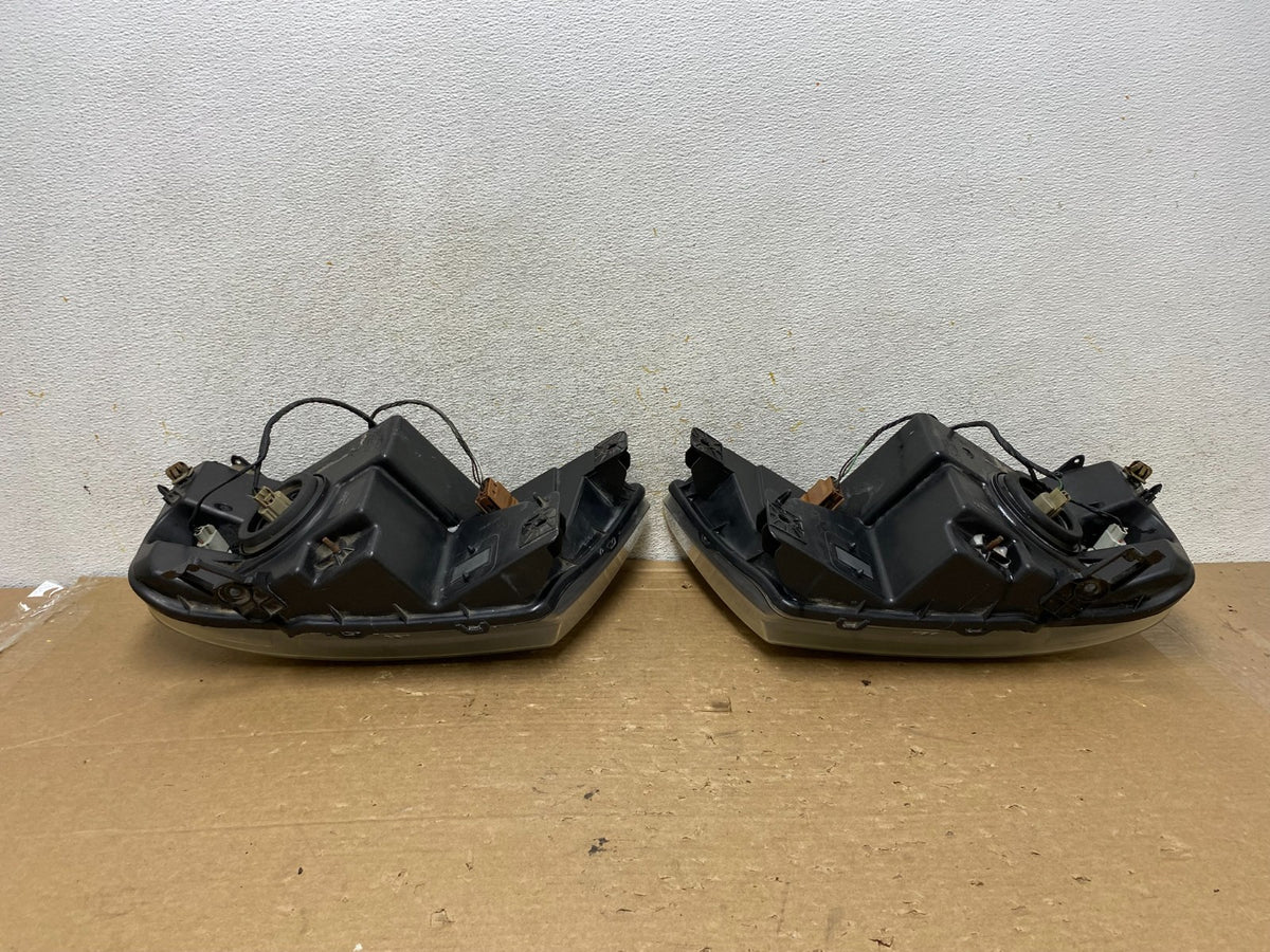 2004 to 2008 Ford F-150 F150 Left+Right Halogen Headlights AH8887 DW8