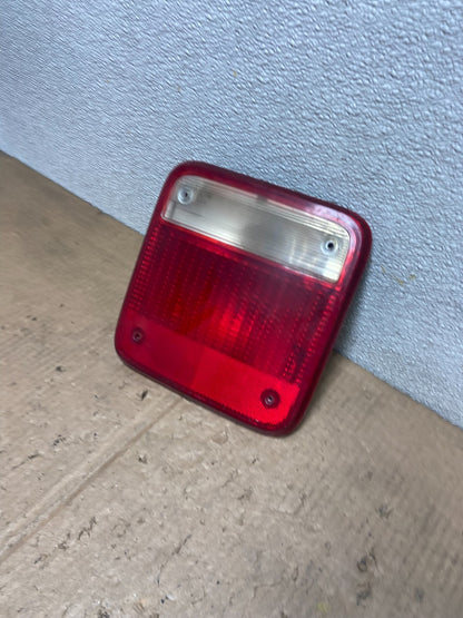 1985  to 1996 GMC G-series Left Driver Lh Side  Tail Light  OEM AA6695  DG1