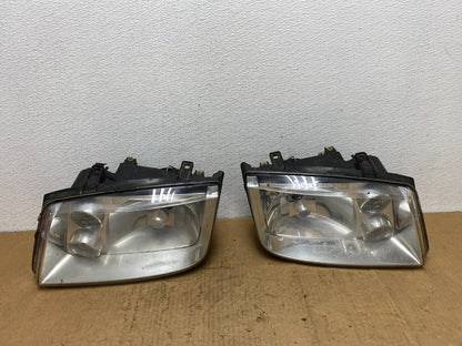 2002 to 2004 Volkswagen Jetta Left+Right Headlights AD0463 DW0