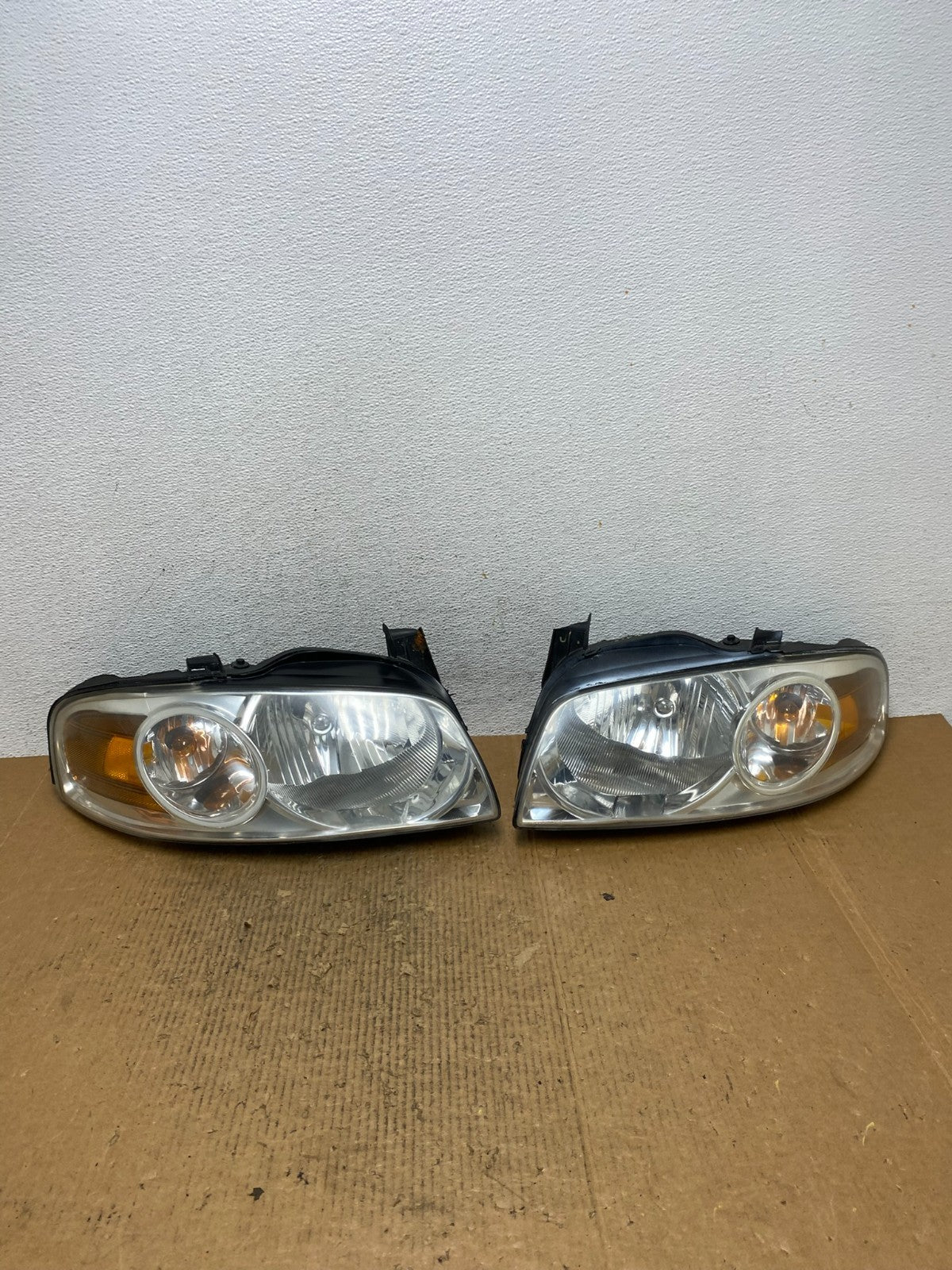 2004 - 2006 Nissan Sentra Halogen Left+Right Headlights AE2657 DW0