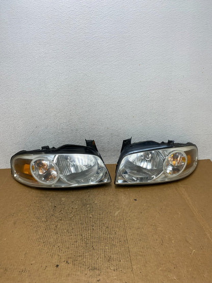 2004 - 2006 Nissan Sentra Halogen Left+Right Headlights AE2657 DW0