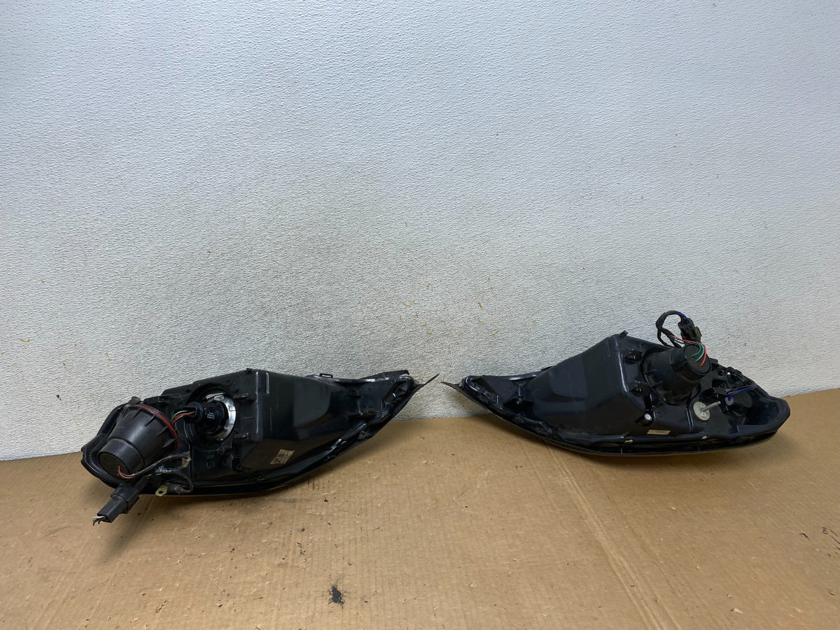 2000 to 2005 Mercury Sable Left+Right Side Halogen Headlights AI8874 DW7