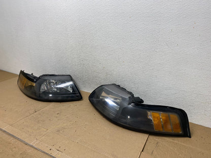 1999 to 2004 Ford Mustang Left+Right Set Side Black Headlights AE6878 DW1
