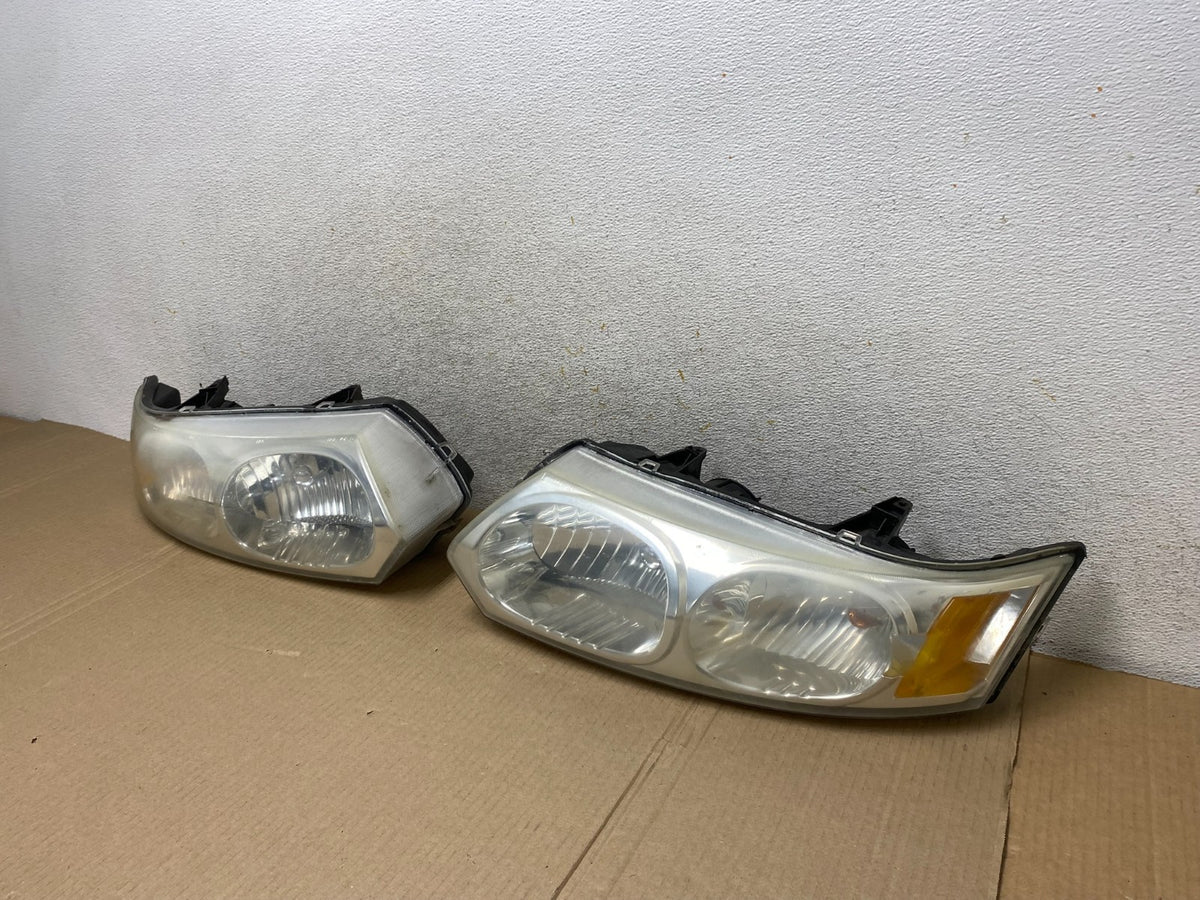 2003 to 2007 Saturn Ion Halogen Headlights Left+Right Side AI9435 LK1