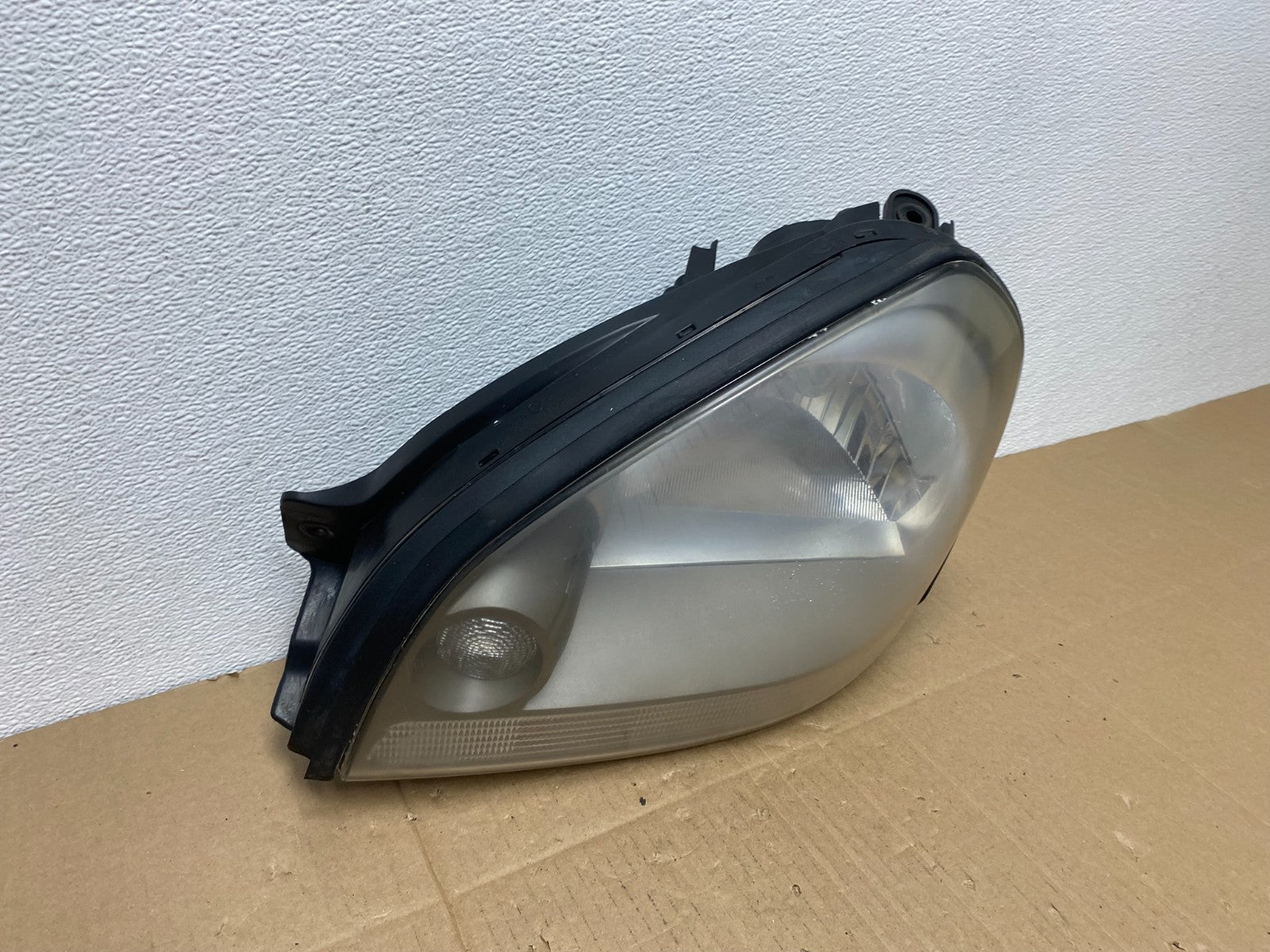 2005 to 2008 Hyundai Tucson Left Driver LH Side Headlight TYC AB8107 DW2